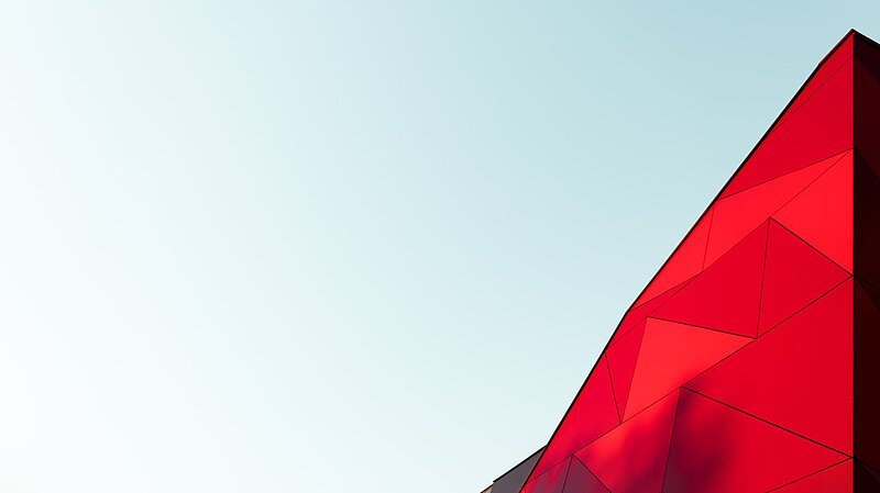 Picture of the sky with a red glass front in the bottom corner