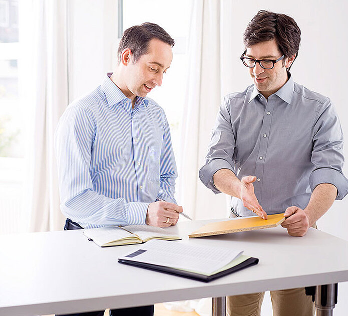 Two employees having a conversation